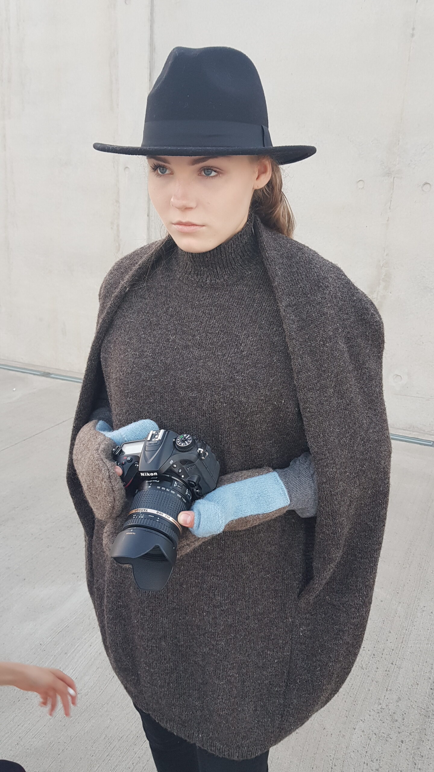 wool mittens with brown undertones with light blue thumbs